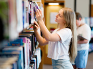 Teenage girl in library