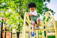 Child on climbing frame