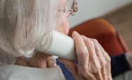 Elderly lady talking on the phone