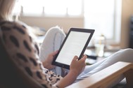Person reading kindle in bed - Image by Pexels from Pixabay
