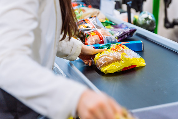 groceries on a supermarket conveyor belt