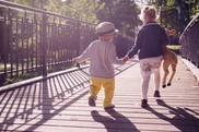 Children walking on bridge