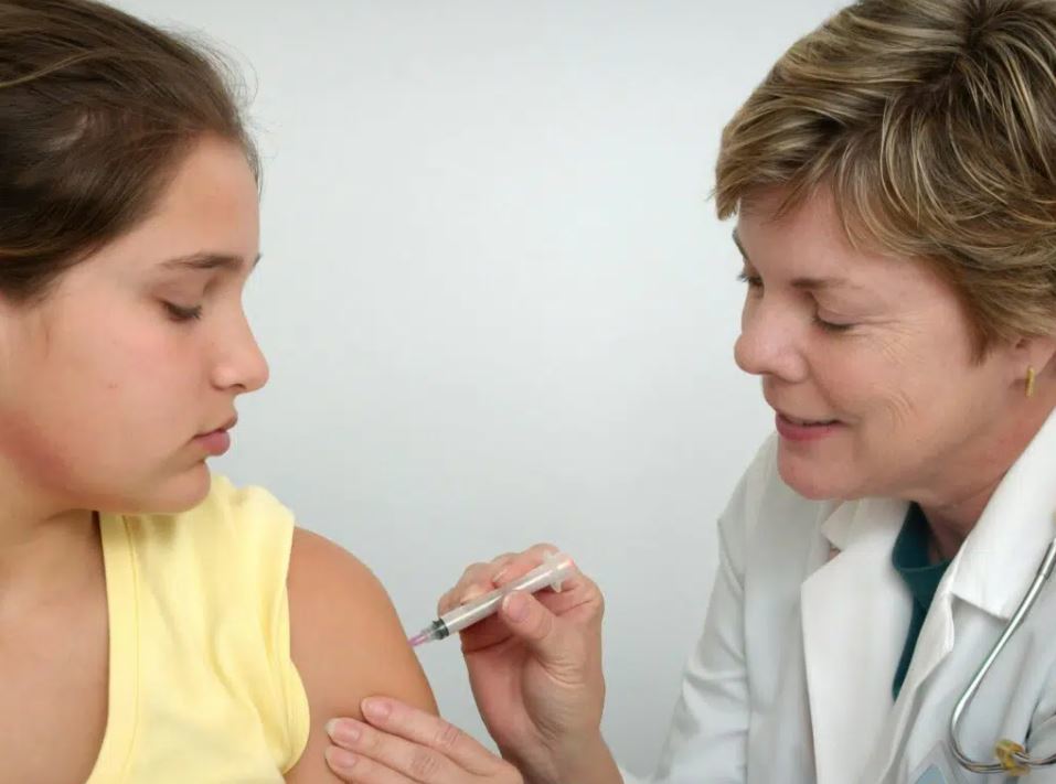 young person being vaccinated