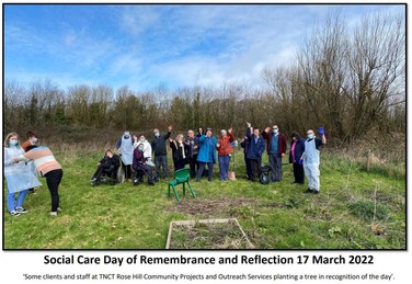 Clients at Rose Hill Community Project planting a tree in recognition of social care day of remembrance and reflection