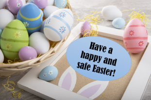 Easter eggs with text saying have a happy and safe easter
