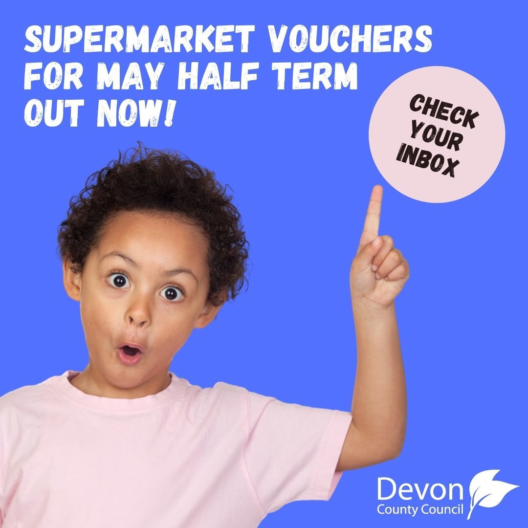 Young boy point upwards to text reading supermarket vouchers for May half term out now. Check your inbox.