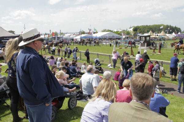 photo taken at a previous Devon County Show, of a crowd watching an equestrian display