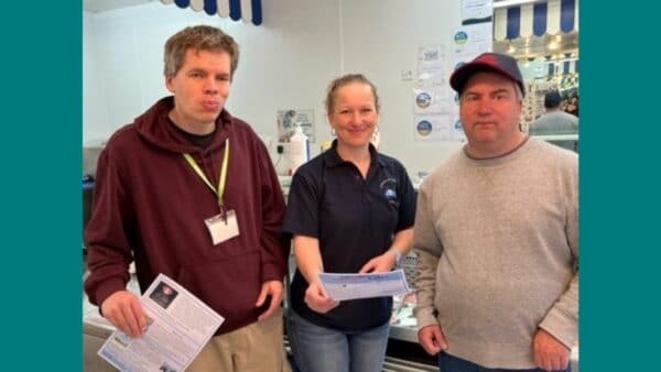(Left to right) Thomas Janman, Emma Carter (from local fishmongers Catch of the Day) and Tristan Powlesland.