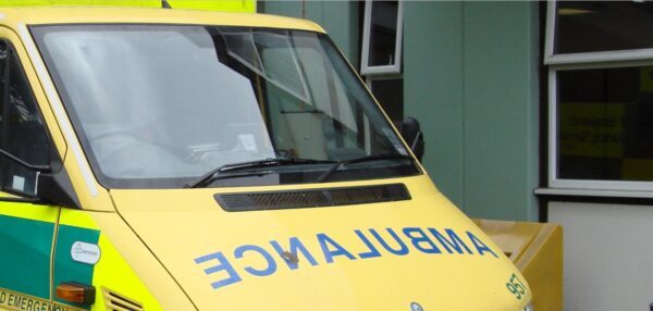 An ambulance parked outside a hospital