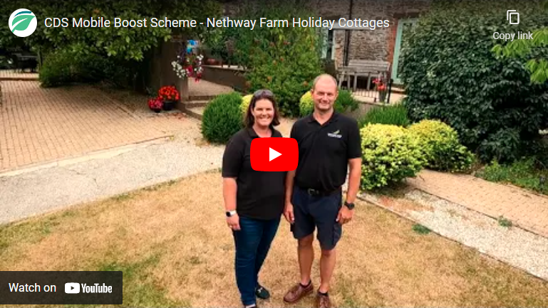 Nathan and Lizzie Figg of Nethway Farm Holiday Cottages, stood outside their farmhouse