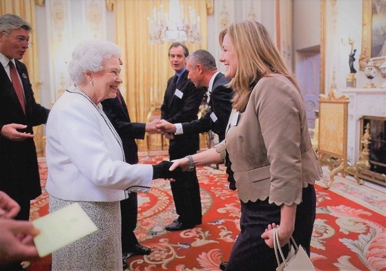 Rosalie meeting HM Queen Elizabeth II