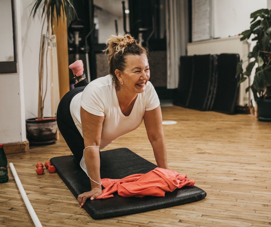 middle aged woman doing yoga