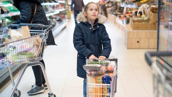 child in supermarket