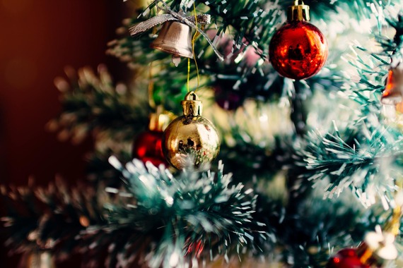 baubles hang on a Christmas tree