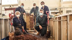 People building the CobBauge wall in 2020