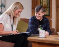 Social worker and young person