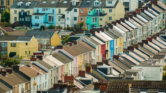 Terraces of colourful housing on a hillside