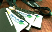 Devon County Council ID passes on a table