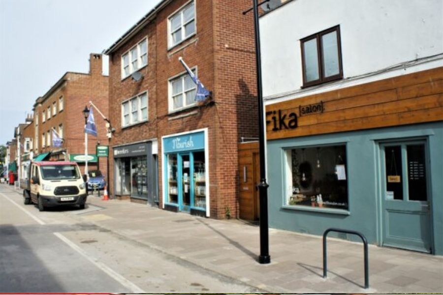 A view along the shops on Magdalen Road in Exeter