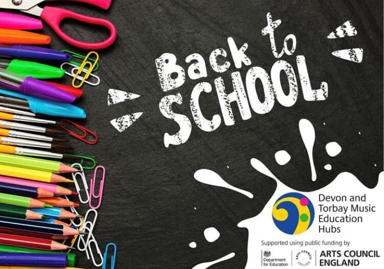 Blackboard with coloured pens and stationary, writing reads 'back to school' with Hub logo
