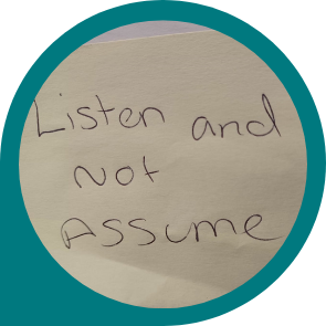 Post-it note saying 'listen not assume'