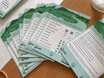 Card game in the style of top trumps with different types of natural flood management