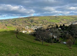 Steep valley sides leading down into Combe Martin village