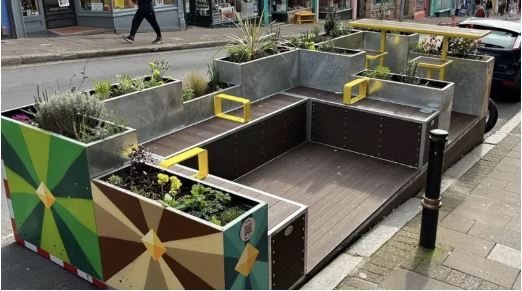 Seating with planting on a moveable structure