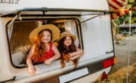 girls and caravan