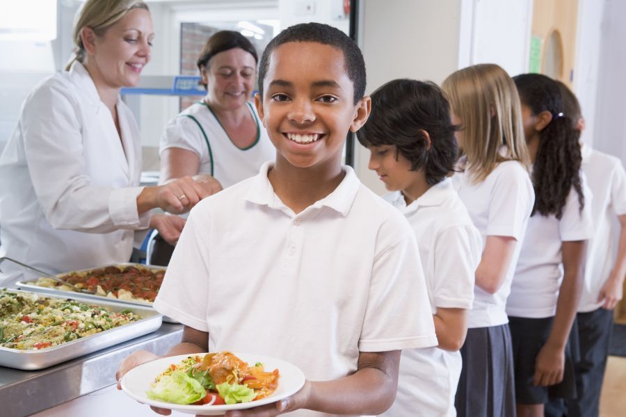 Child with school lunch