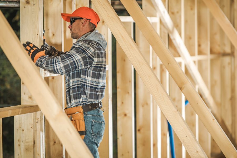 A builder building a house