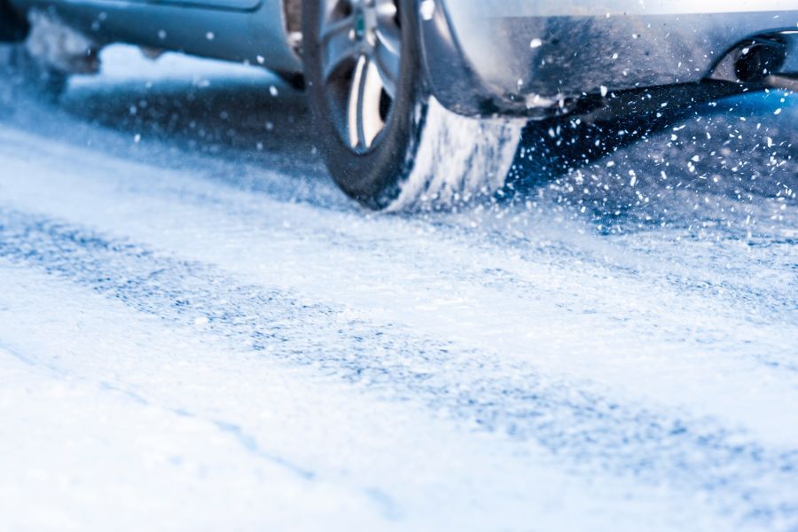 Car driving on snowy road