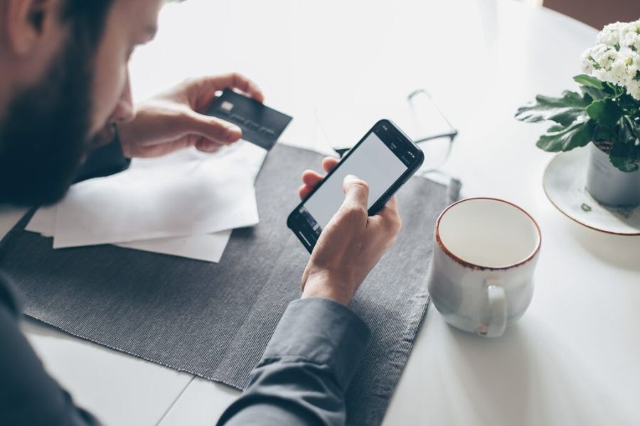 Person making a purchase online using their phone