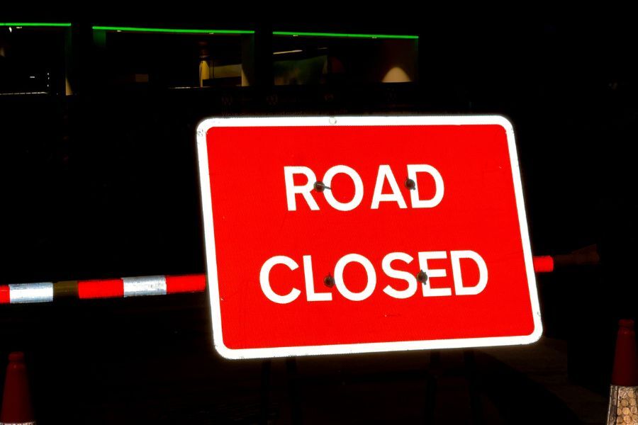 Road closed sign at nigh time