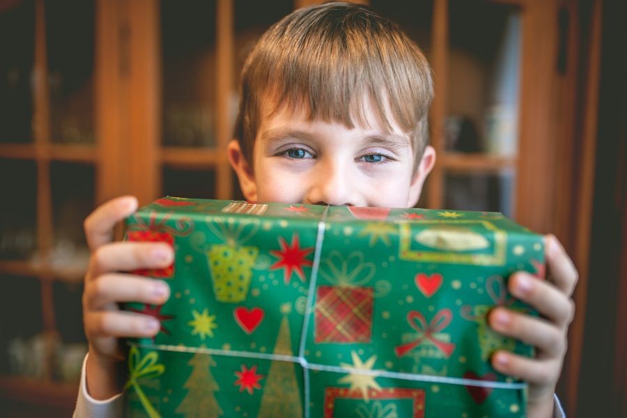 Young boy with Christmas present