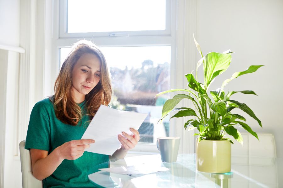 Lady reading letter