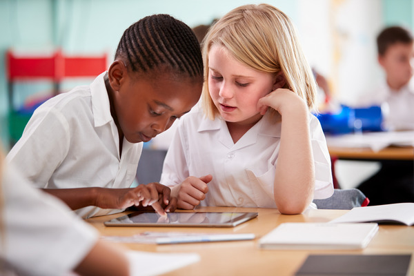 Children learning braids