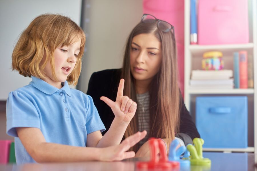 Teacher working with pupil