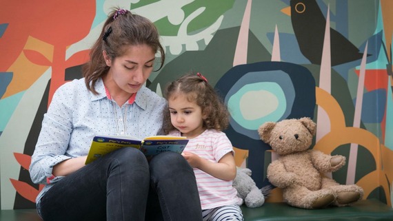 Mother and child in library