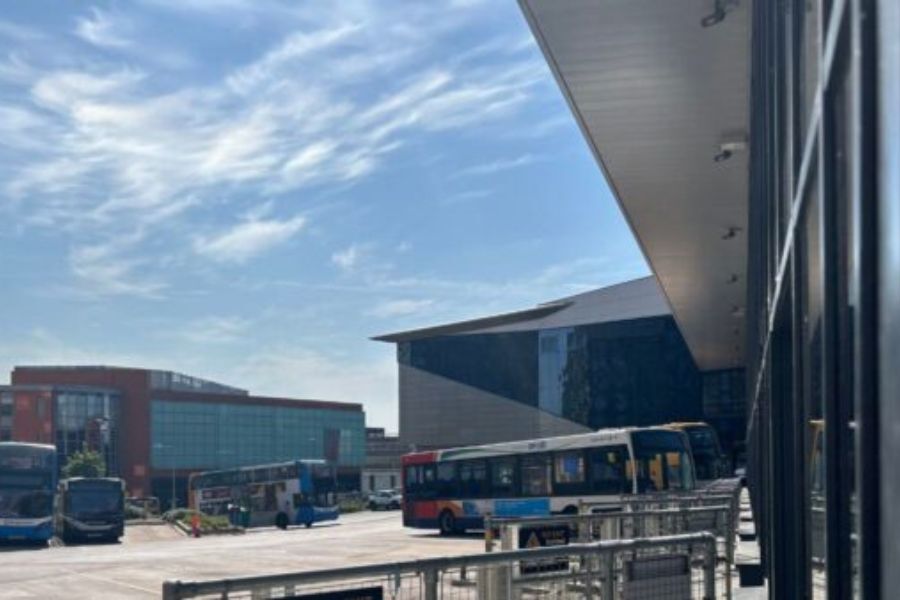 Exeter bus station. Photo taken looking down the line of buses at the bus station.