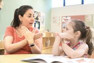 speech and language therapist and child
