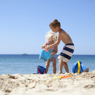 children playing on the beach