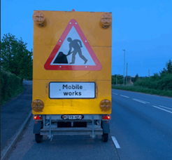 Image showing a vehicle warning of mobile works