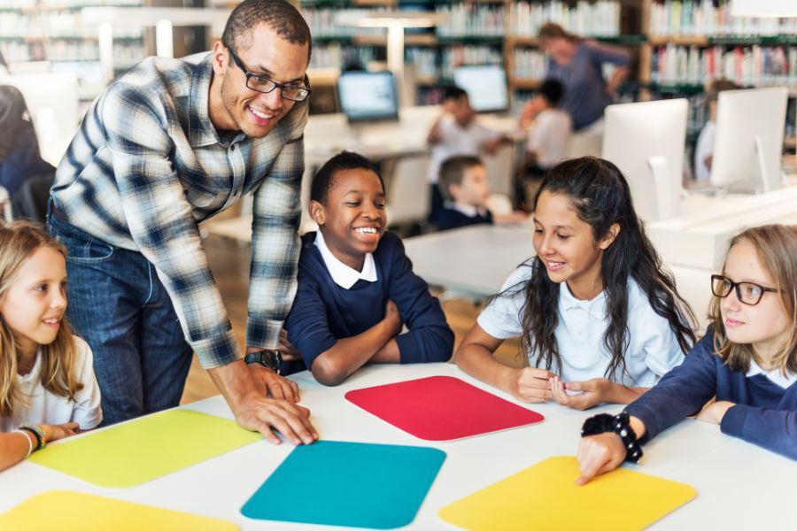 Children in a classroom with teacher