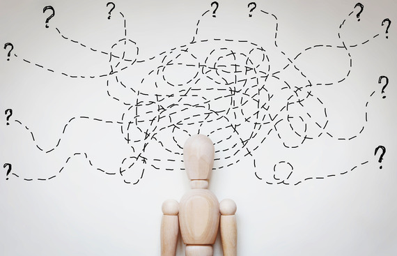 Wooden man under stress with problems