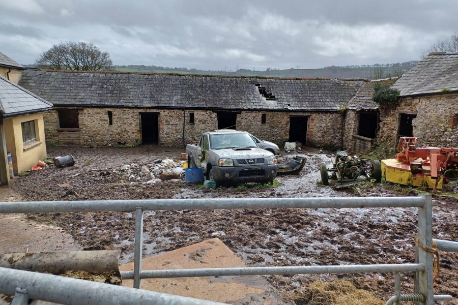 The farm yard at Crook Farm, with a lot of slurry on the ground