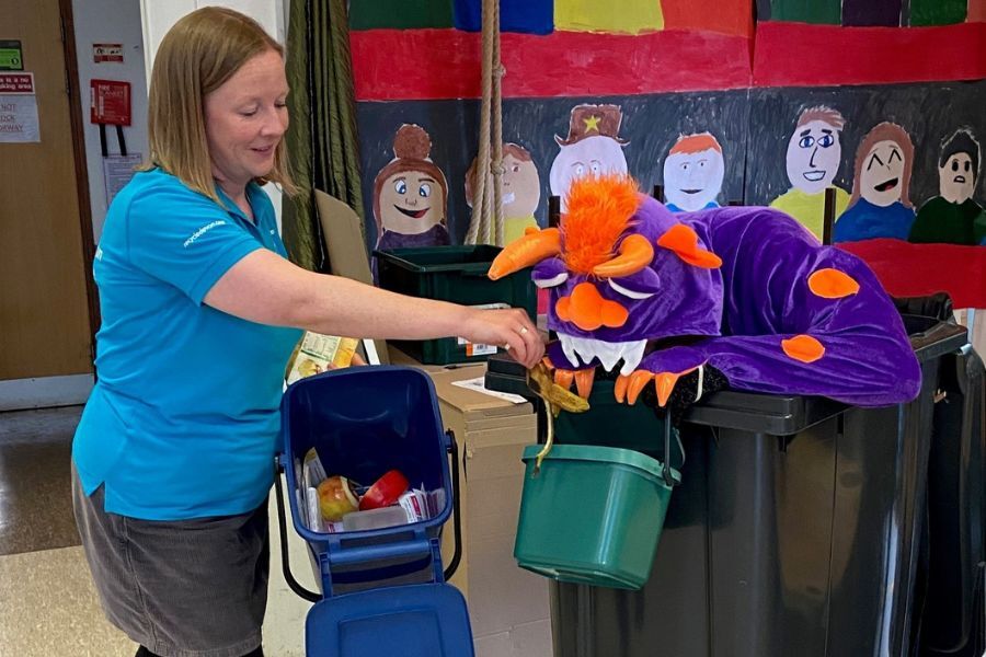 Bonster, the food waste-eating monster, in a wheely bin