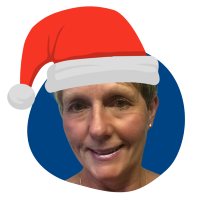 Jackie Colby wearing a Santa hat