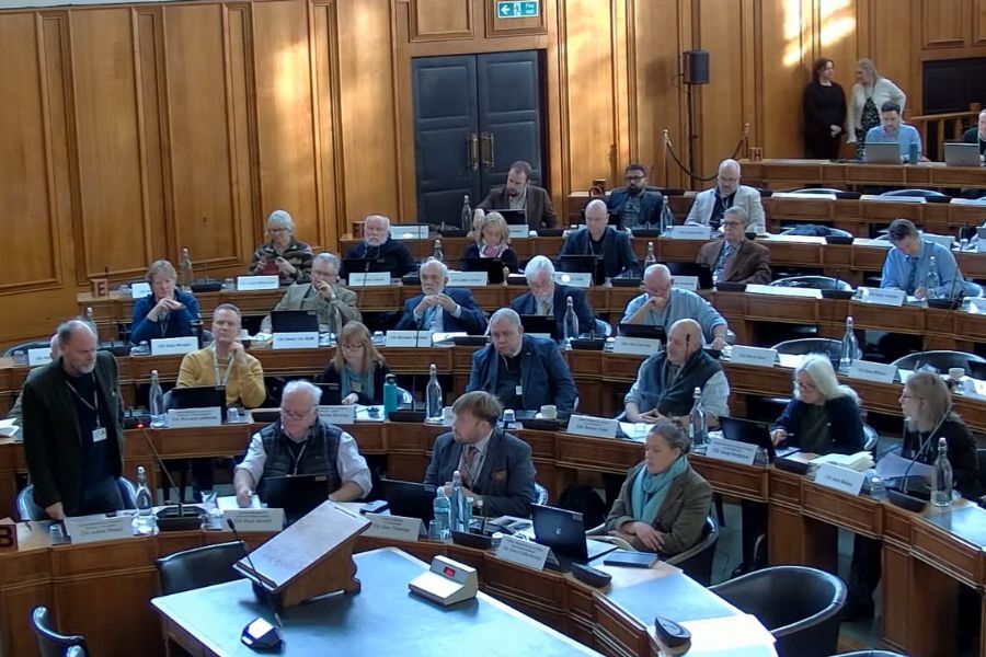 Councillors debating in the council chamber during the meeting 