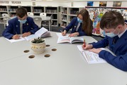 Star Academies secondary age children working in communal area wearing face masks